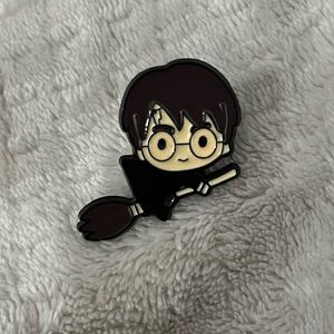 Harry potter on a broom pin badge